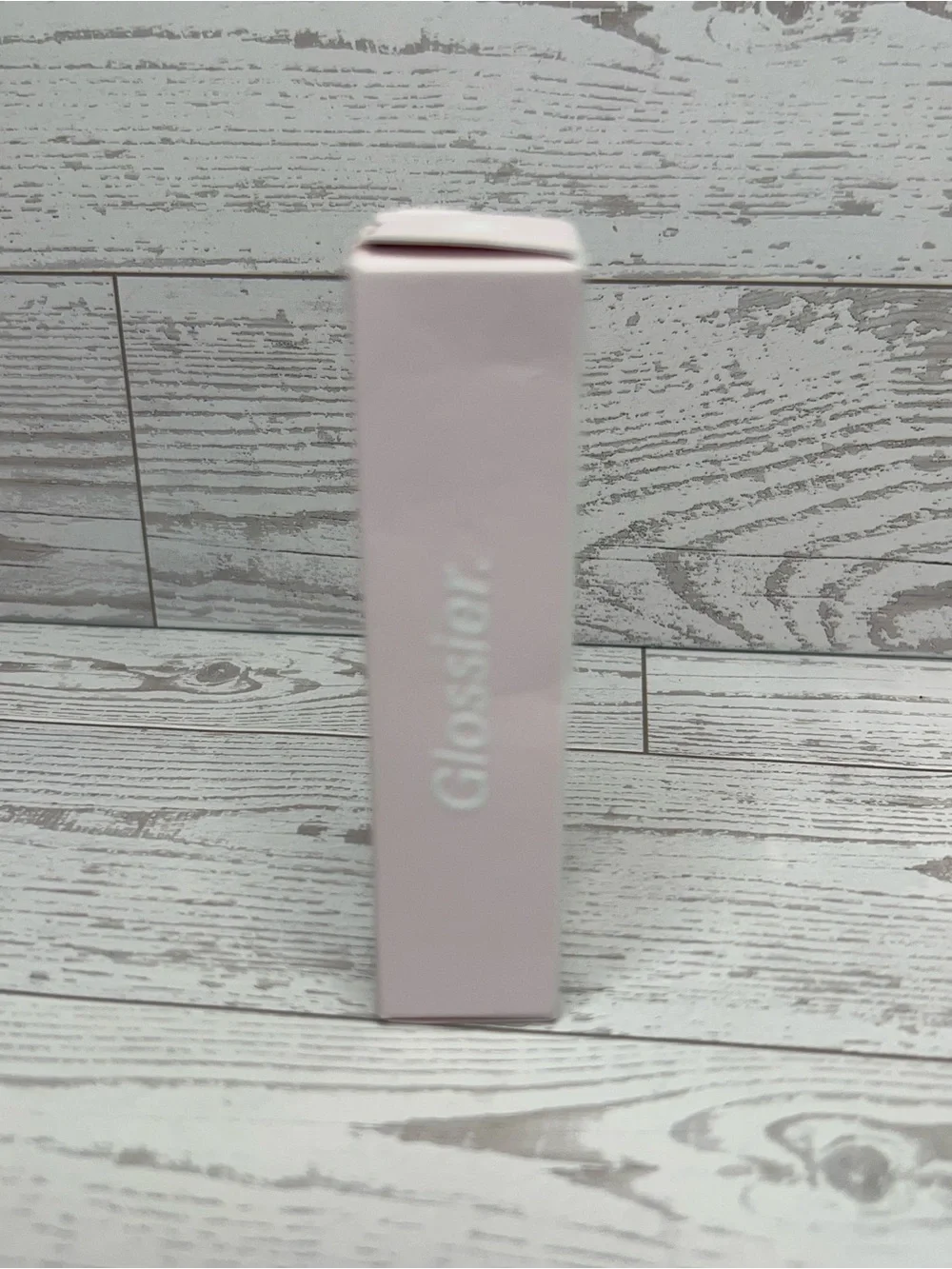 Glossier G suit, soft touch lip cream, shade JET